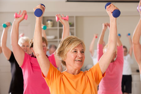 Women exercising with handweights