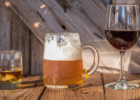 cups of beer, wine and alcohol showing a drinking problem with alcoholism and binge drinking