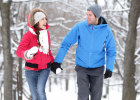 couple walking outside in the snow