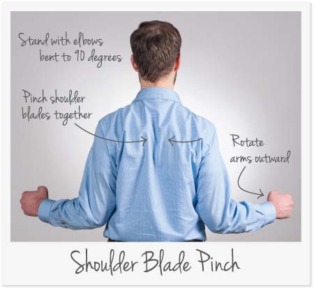 Man demonstrating shoulder blade pinch stretch