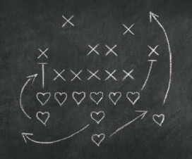 sports play on chalkboard with x's and hearts