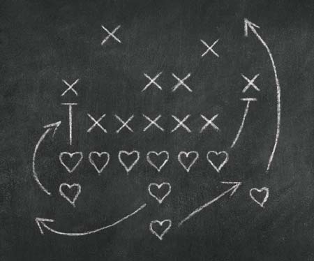 sports play on chalkboard with x's and hearts