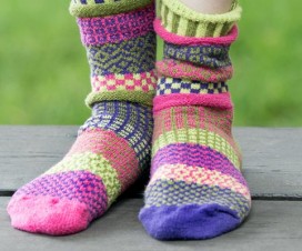 woman wearing colorful wool socks outside