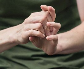female hands close-up cracking knuckles