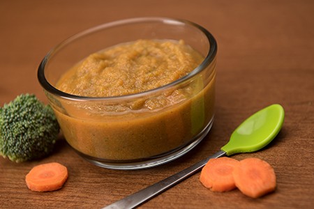 bowl of baby food - carrots and broccoli