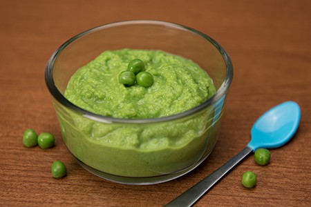 bowl of baby food - peas