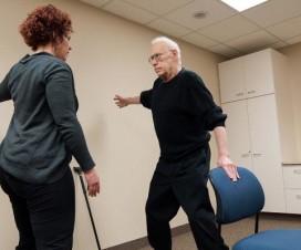 Man practicing movement therapy through the LSVT BIG program