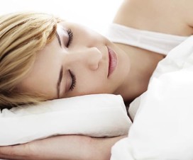 Woman sleeping comfortably on pillow