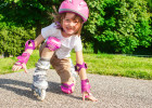 skater girl wearing pink pads