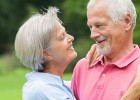 Older couple hugging - Recognizing stroke warning signs. Act FAST