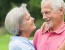 Older couple hugging - Recognizing stroke warning signs. Act FAST