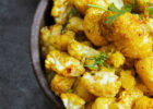 Dish of cauliflower roasted with turmeric. Try this recipe