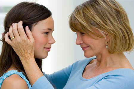 Mother having a heartfelt conversation with teenage daughter - Immunotherapy