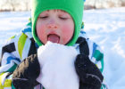 Kid eating a piece of snow - Is eating snow safe?