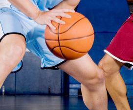 Basketball player dribbling ball - Meniscus repair vs. removal