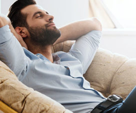 Man relaxing in a chair - Avoiding burnout