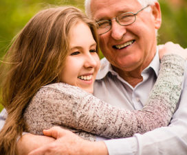 Granddaughter hugging her grandfather - Is DNA destiny?