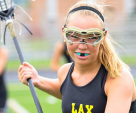 Young woman playing lacrosse - Mouthguard 101