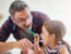 Dad and daughter brushing teeth mouth gums tongue oral cancer
