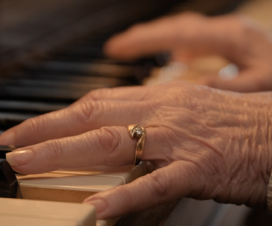 Elderly hands playing piano