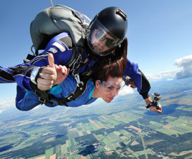 Man and woman skydiving - Adrenaline
