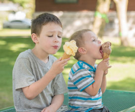 Two boys eating ice cream - Brain freeze
