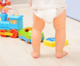 Baby standing in diaper - Prickly heat