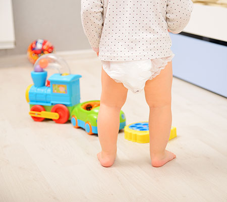 Baby standing in diaper - Prickly heat
