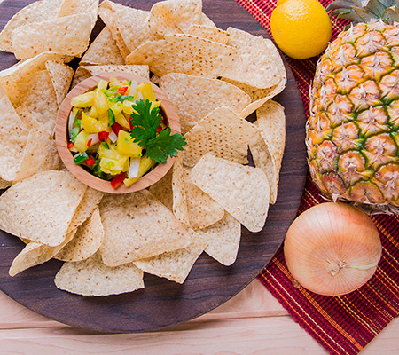 Serving platter of chips and pineapple salsa - Pineapple Salsa Recipe