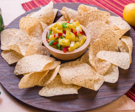 Serving platter of chips and pineapple salsa - Pineapple Salsa Recipe