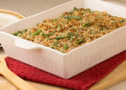 Healthy Green Bean Casserole in a white casserole dish - Thanksgiving casserole recipe