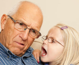 Granddaughter yelling into grandfather's ear - Chemotherapy-related hearing problems