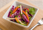 Bowl of red cabbage coleslaw with apples - Apple Cider Vinegar and Red Cabbage Coleslaw with Apples