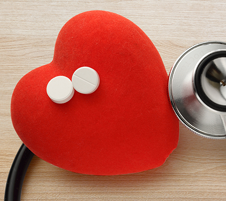 Aspirin tablets and a stethoscope - Aspirin and your heart health