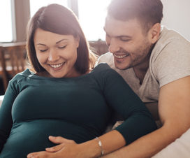 Expectant mother and her partner laughing - Nitrous oxide for labor and birth
