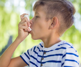 Boy using an inhaler - How to use an inhaler