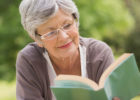 Senior woman reading a book - Medicare Annual Wellness Visit, adult checkups