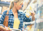 Woman grocery shopping - Do food expiration dates matter?