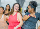 Two women dancing in Zumba - Dense breast tissue