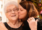 Grandmother and daughter hugging at Christmas - Holiday heart attacks