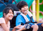 Brother with special needs with his sister at the park - Siblings of kids with special needs