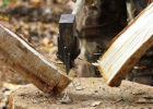 Axe chopping wood - Benefits of chopping wood, being a "woodchuck"