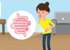 Woman with upset stomach, close up of intestines - illustration - Crohn's disease