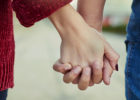 Couple holding hands - Sexual health and intimacy