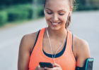 Woman texting during her run - Building strong bones while you're young