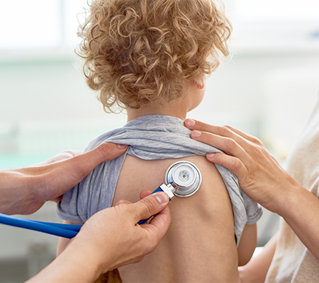 Stethoscope on a child's back - What is acute flaccid myelitis, the polio-like virus?