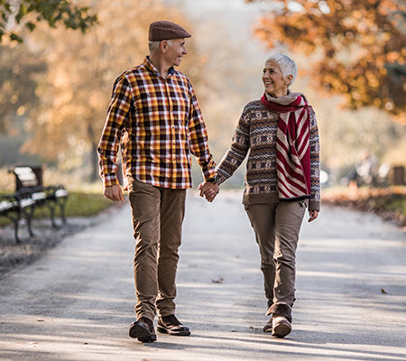 Cancer / treatment / Health / Couple walking on fall day