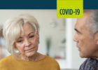 A woman listens as her doctor explains why she might be more susceptible to COVID-19 due to her chronic disease.