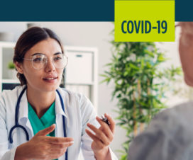 A doctor asks her patient screening questions.