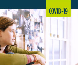 A woman talks to her daughter about COVID-19.